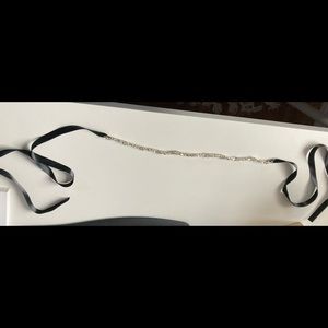 Never worn silver and black satin rhinestone belt.